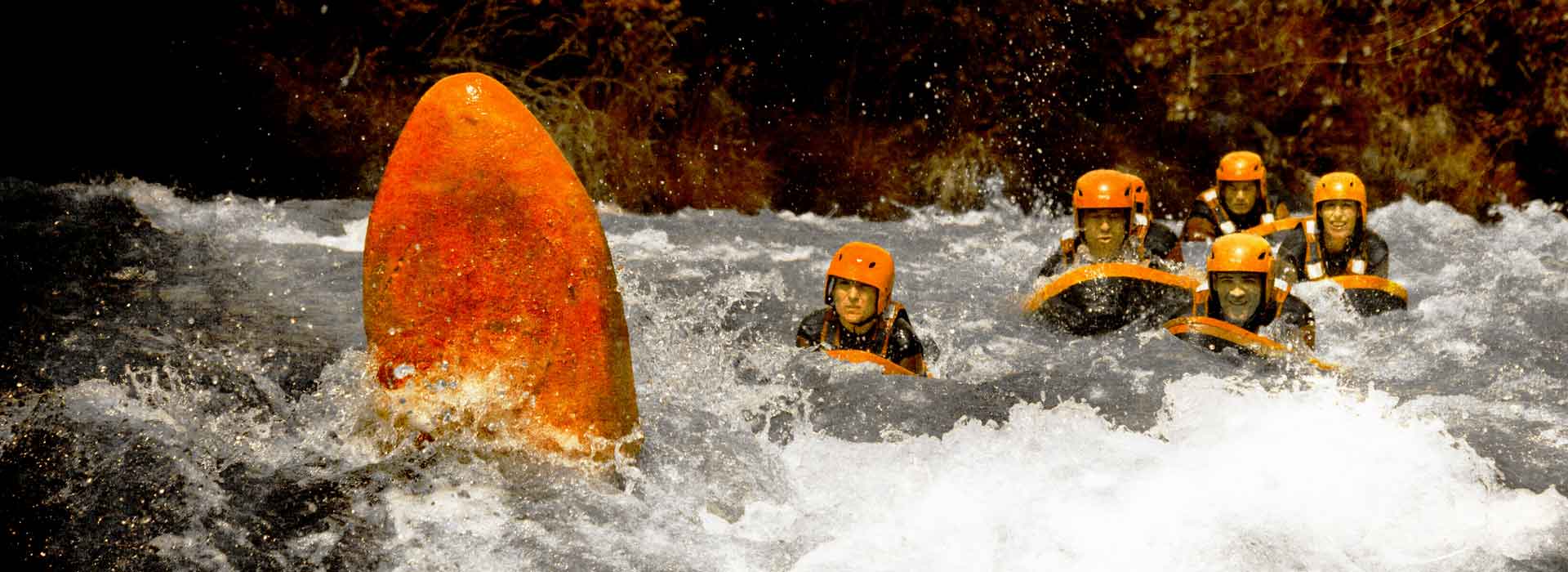 Flotilla of 7 river board near Bourg-St-Maurice in the Isere rapids