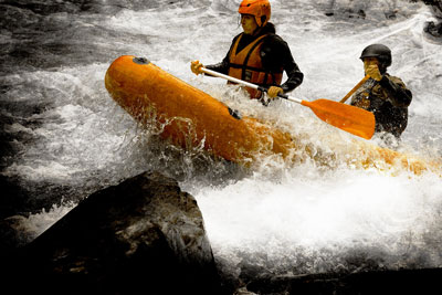 The Client and his guide in the canoe-raft on the Isere in Bourg-St-Maurice